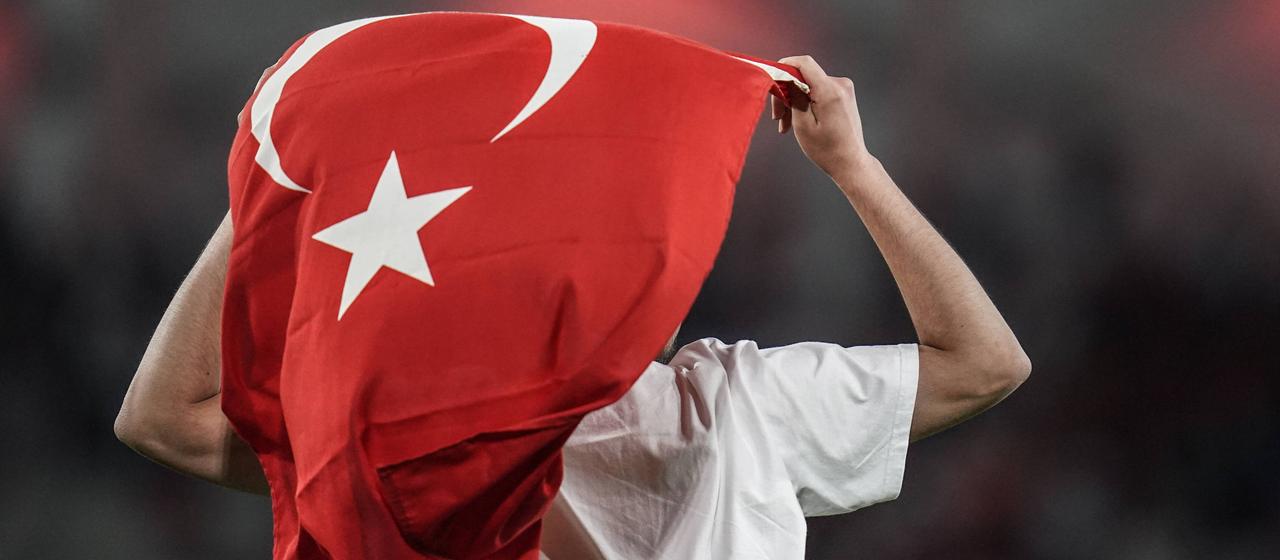 A fan with a Turkish flag