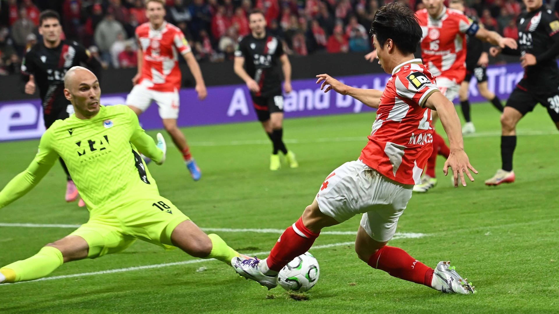 Under pressure: Mainz' Kawasaki in attack against Mostar.