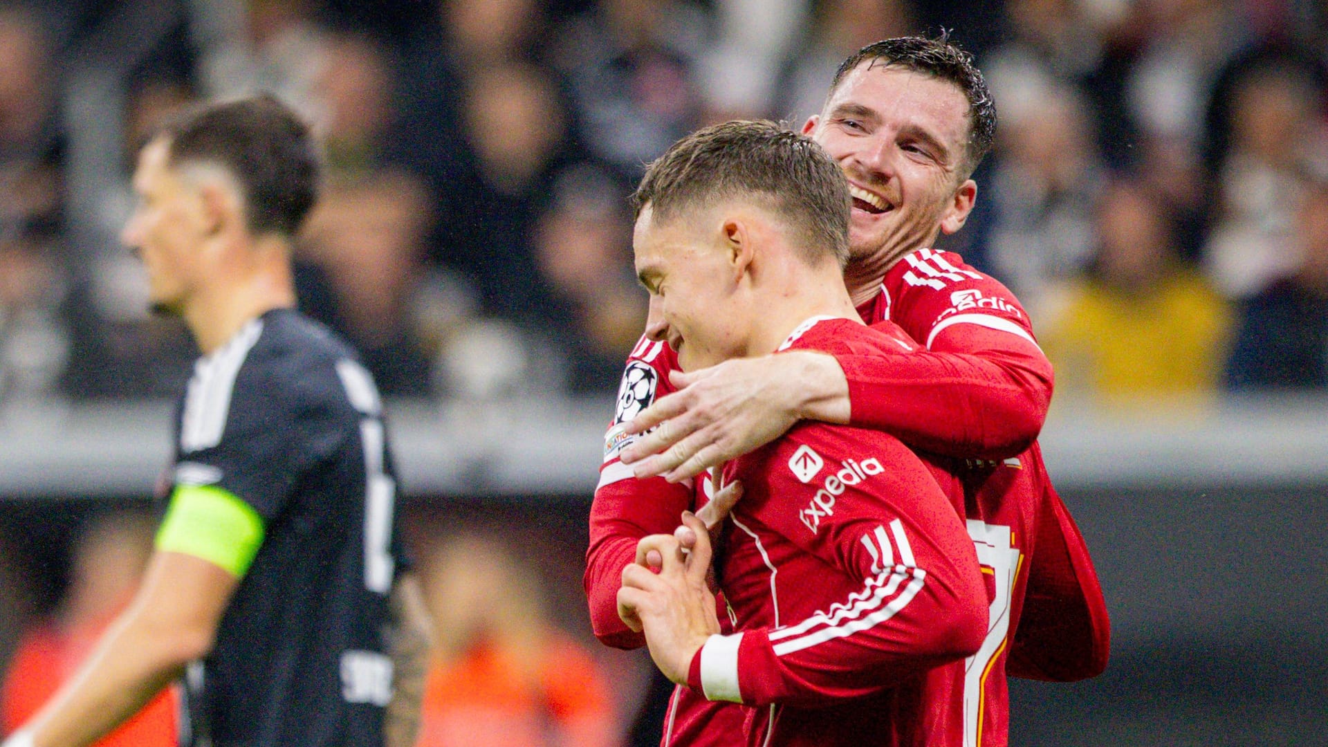 Andrew Robertson (l.) hugs Florian Wirtz: The German scored two goals. Andrew Robertson (l.) hugs Florian Wirtz: The German scored two goals.