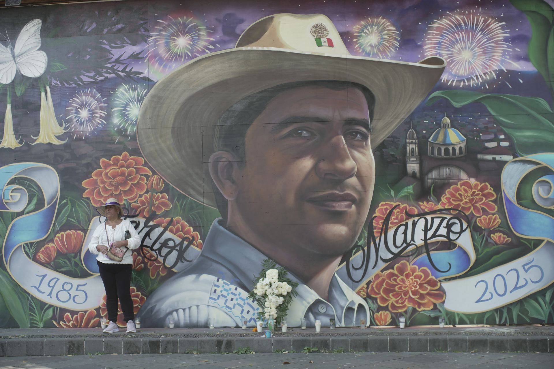 Mural of murdered Carlos Manzo in Mexico City.