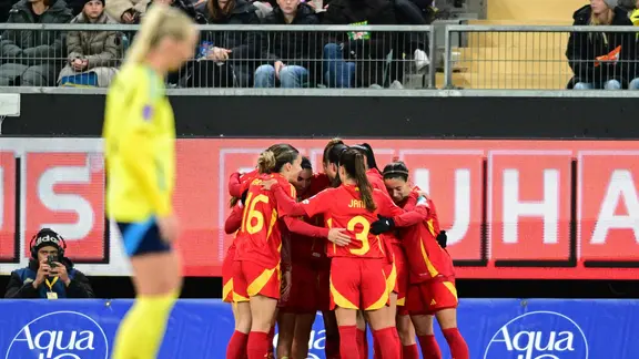 The Spanish women's national team celebrates their goal