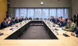American and Ukrainian negotiators at the table in Geneva on Sunday.