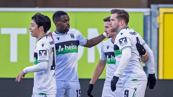 Hanover's players celebrate a goal