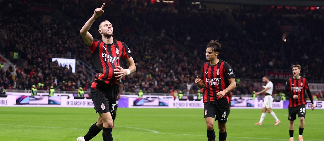 Milan's Strahinja Pavlovic celebrates after scoring against AS Roma