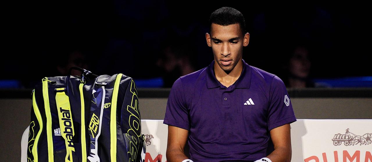 Felix Auger-Aliassime on the bench