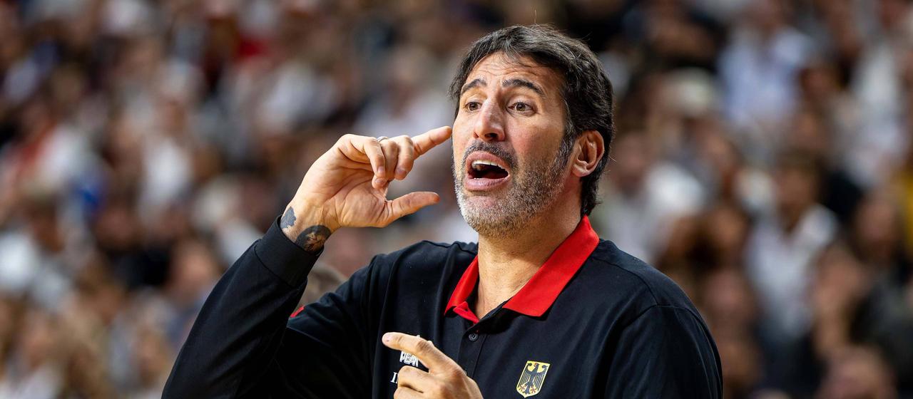 Germany's national basketball coach Alex Mumbru in the test match against Spain before the European Championships