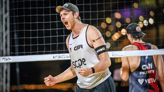 Nils Ehlers clenches his fists in celebration.