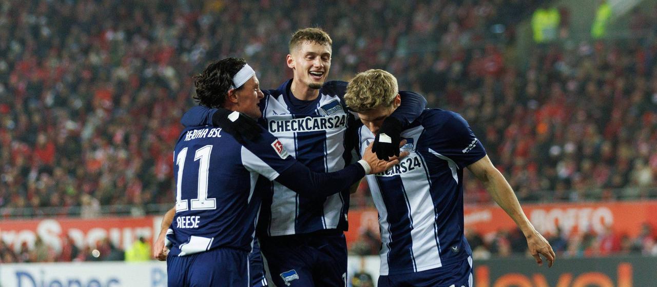 Professional soccer player Luca Schuler (M.) from Hertha BSC celebrates his goal against 1. FC Kaiserslautern