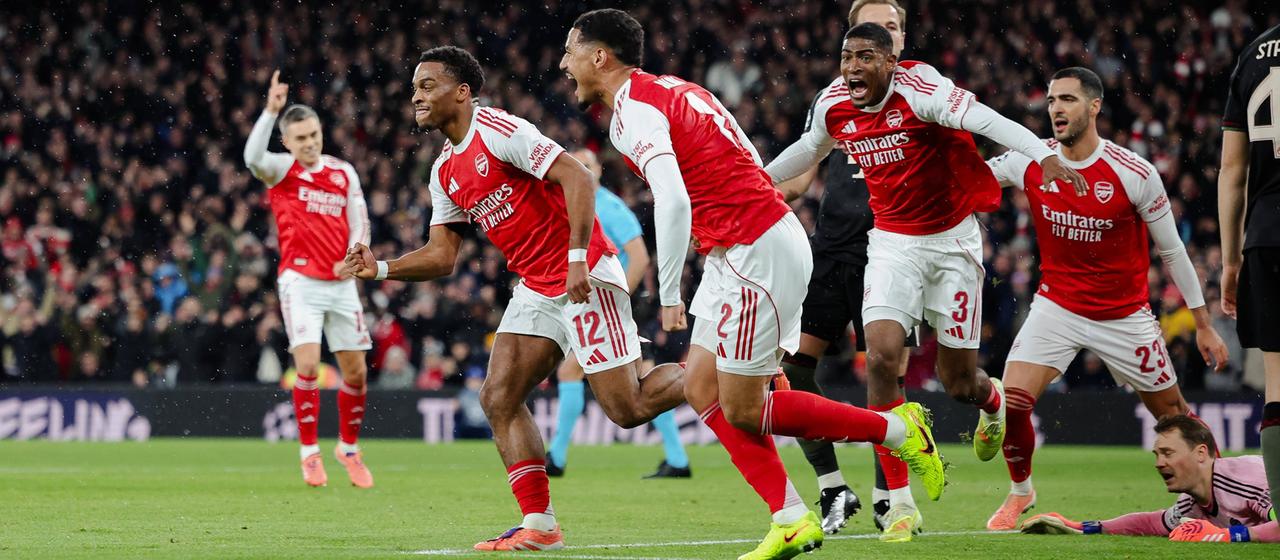 The Arsenal FC players celebrate Justin Timber's opening goal (2nd from left) in the game against Bayern Munich