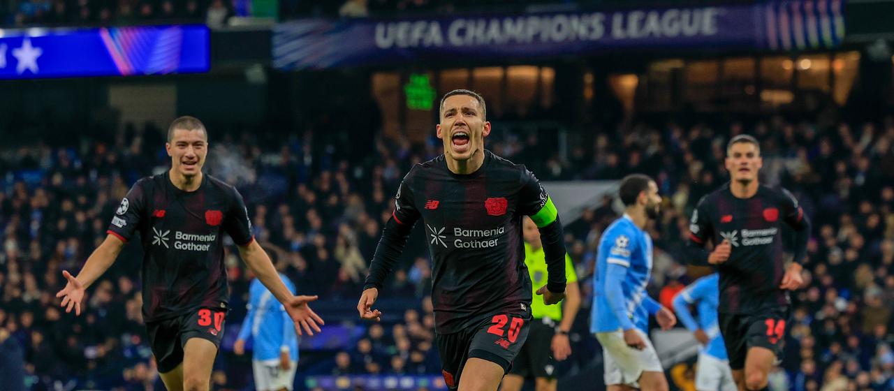 Leverkusen's Alejandro Grimaldo celebrates his goal 
