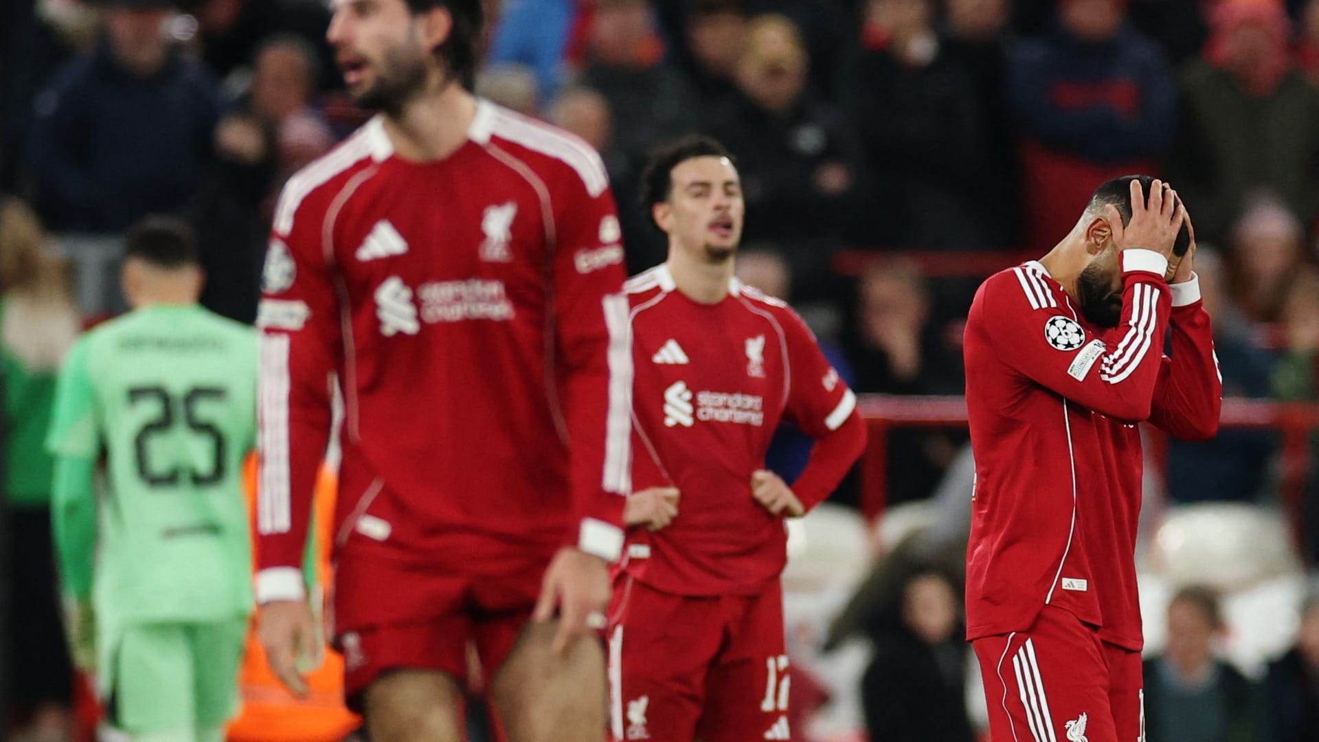 Liverpool players after the defeat against PSV Eindhoven.
