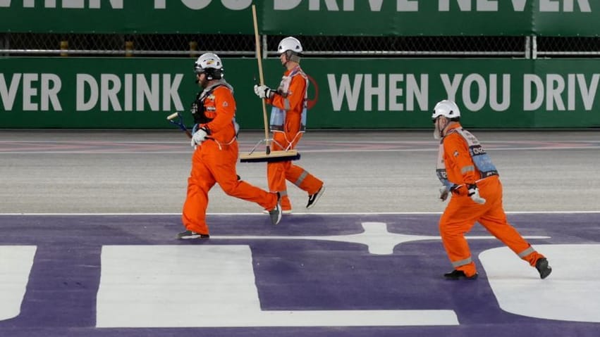 Safety risk: Auxiliary workers on the route in Las Vegas.