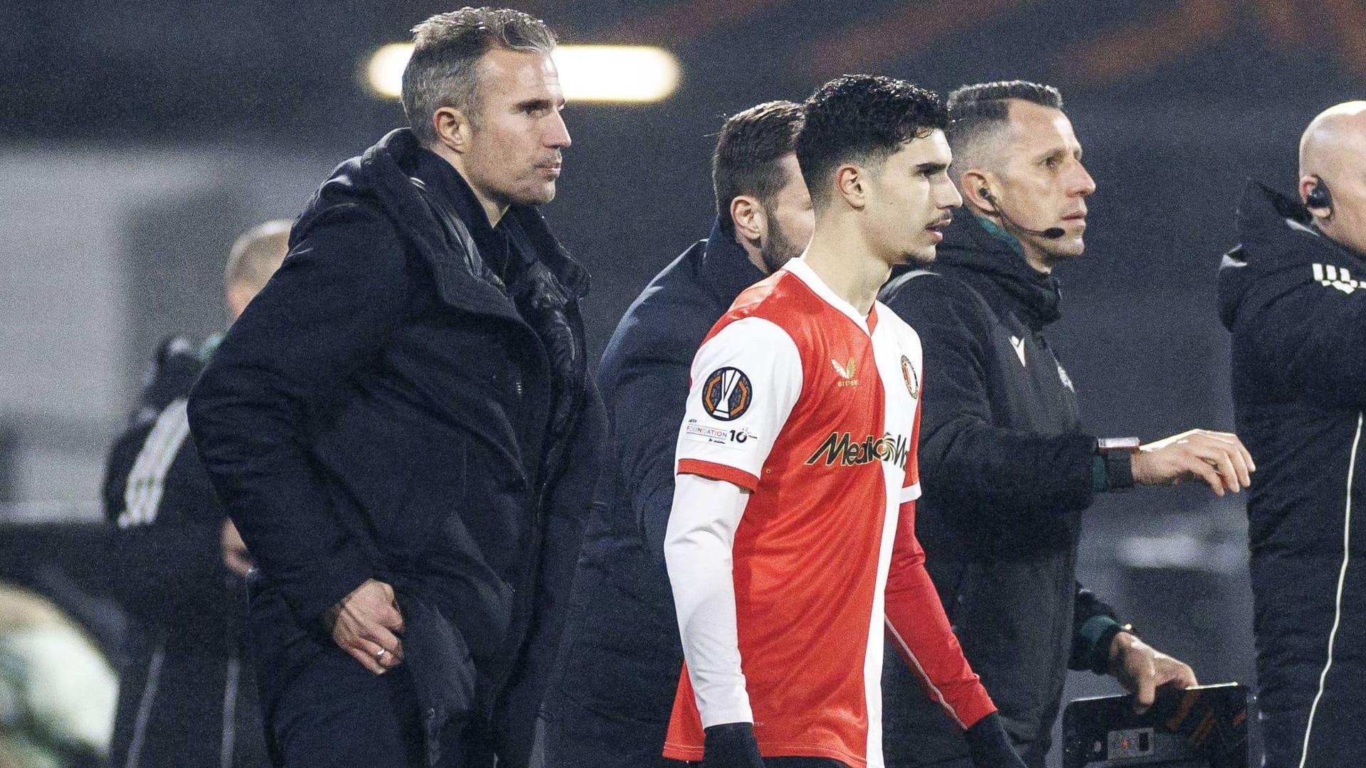 Proud dad: Robin van Persie (left) when his son Shaqueel was substituted.