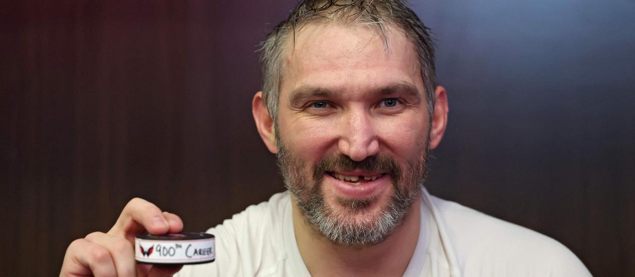Alex Ovechkin of the Washington Capitals with the puck after his 900th goal in the NHL in the game against the St. Louis Blues
