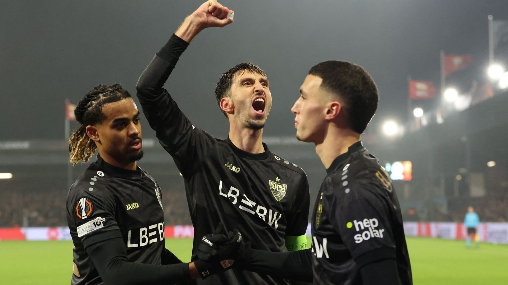 Shouting out the cheers: Stuttgart's Assignon, Karazor and El Khannouss (from left) celebrate in the game in Deventer.