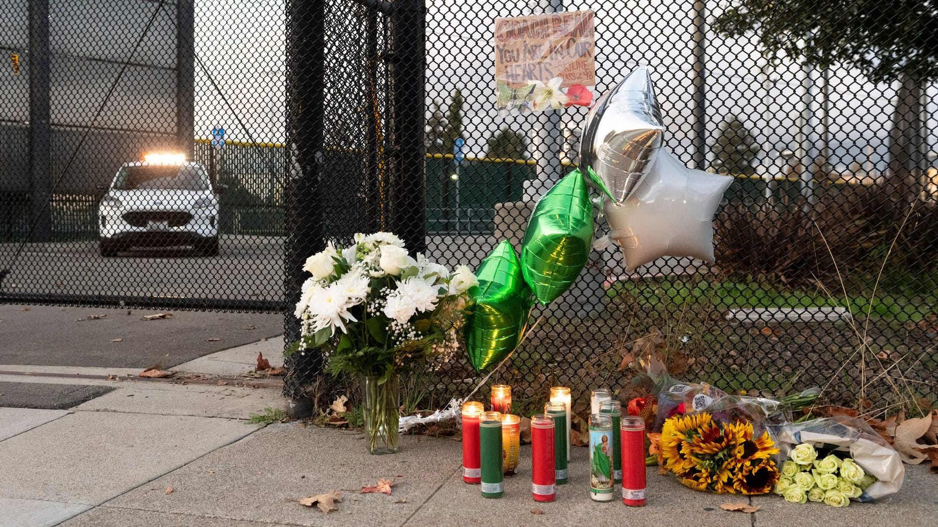 Remembering John Beam: Candles were spontaneously lit and flowers were placed on the university grounds.