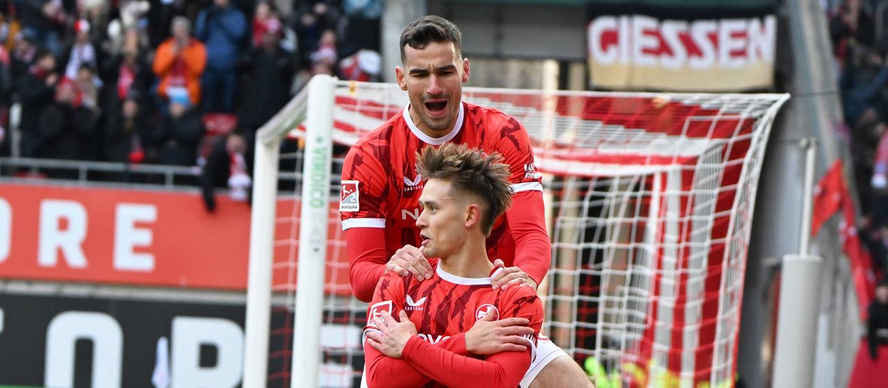 Kaiserslautern's Naatan Skyttä celebrates his goal with teammate Ivan Prtajin