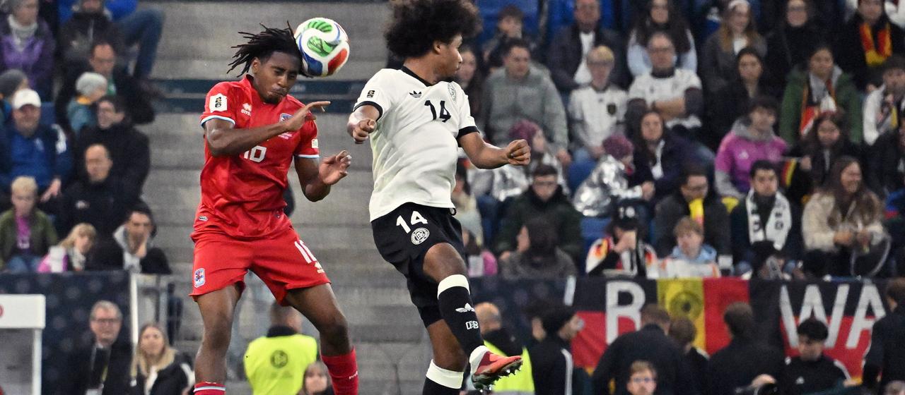 Full commitment: Leandro Barreiro in an aerial duel with Serge Gnabry.