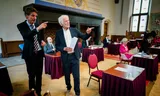 Senator Peter Nicolaï (with striped suit) prior to a vote in the Senate. 