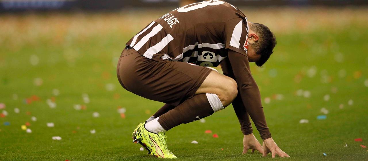 St. Pauli's Mathias Pereira Lage looks down in disappointment