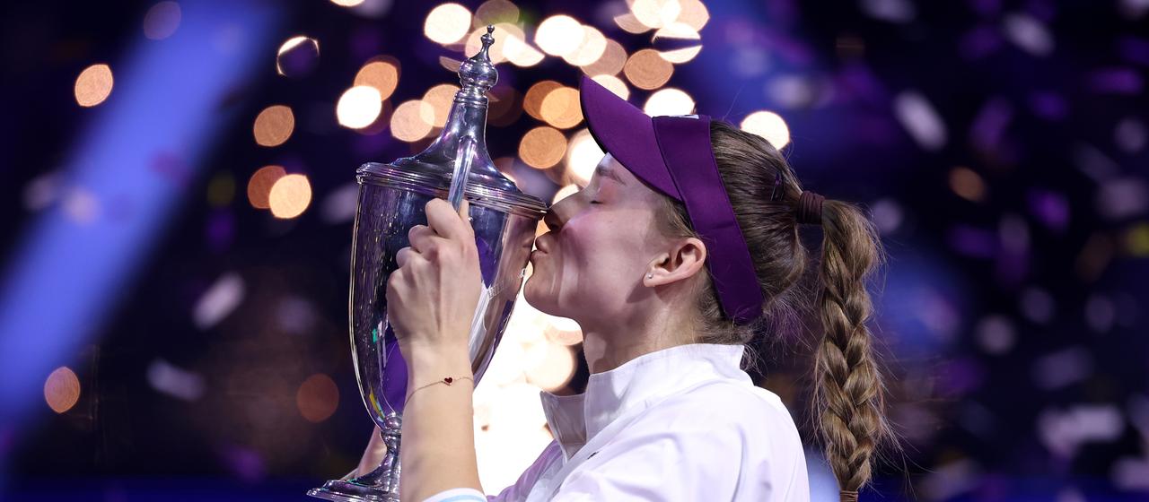 Elena Rybakina kisses the trophy