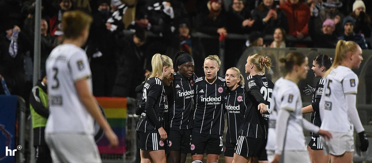 The Eintracht players celebrate Nicole Anyomi's equalizer.
