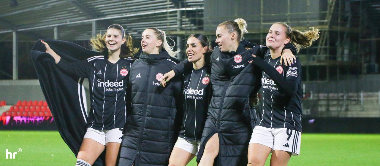 The Eintracht Frankfurt women cheer in Eindhoven