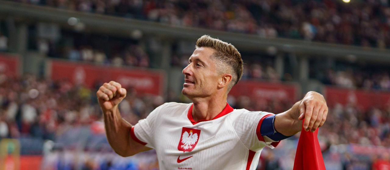 Poland's Robert Lewandowksi celebrates his goal