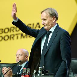  Hans-Joachim Watzke waves after being elected as the new BVB president.
