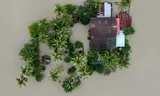 Aerial view of a house amid major flooding in Kangar, northern Malaysia, on November 28. 