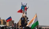A few days after the coup on July 26 last year, supporters of the new military junta waved flags of Russia and Niger. The military is seeking support from Russia, Iran and Turkey and has chased the French away.