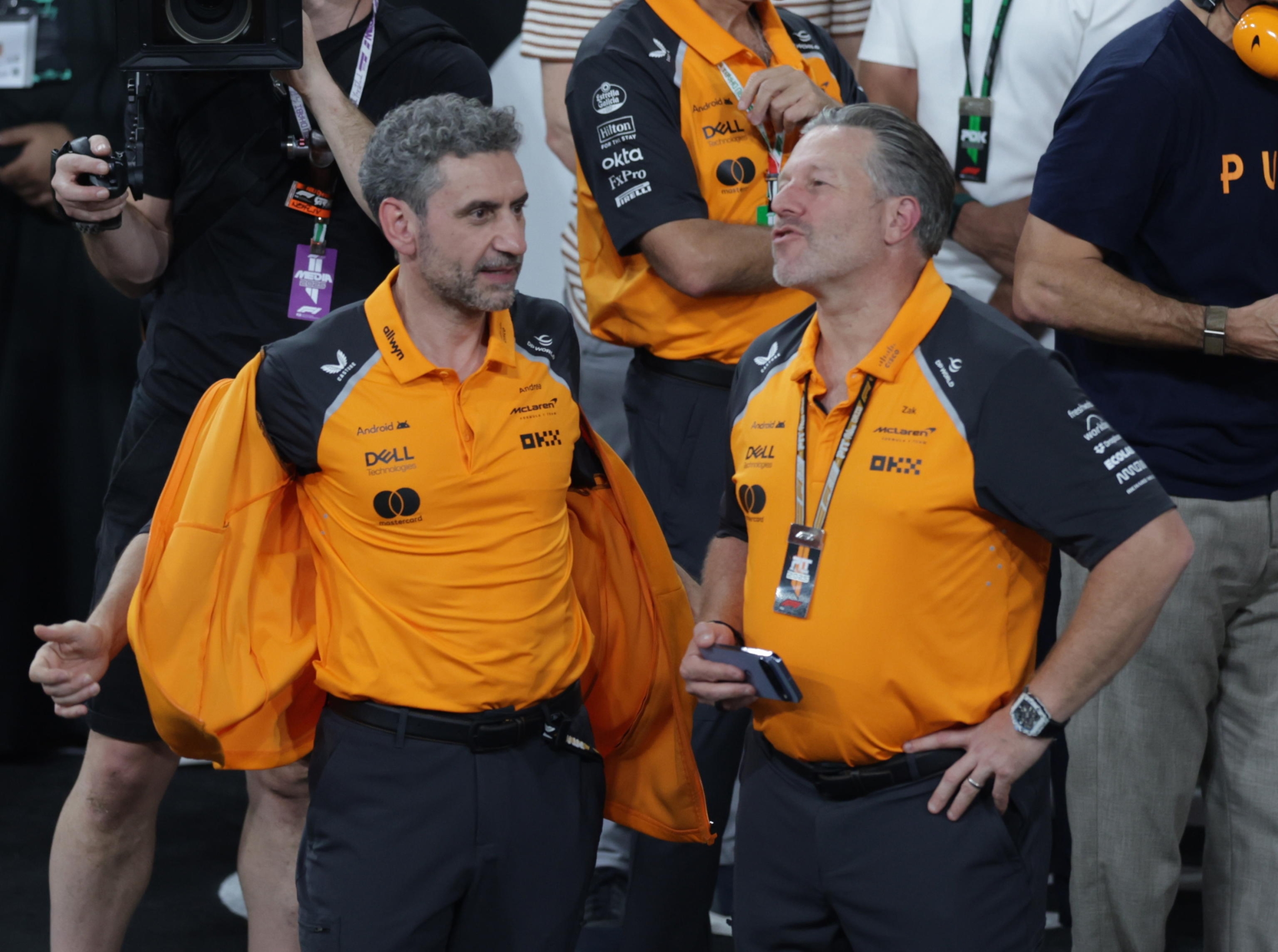 epa12577027 McLaren Racing CEO Zak Brown (R) and team principal Andrea Stella after the Formula One Abu Dhabi Grand Prix at the Yas Marina Circuit racetrack in Abu Dhabi, United Arab Emirates, 07 December 2025. EPA/ALI HAIDER