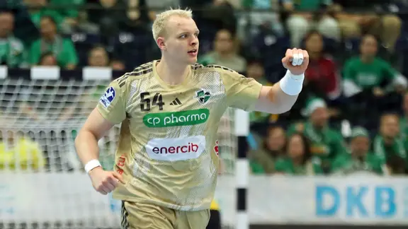 Hanover's handball player Justus Fischer clenches his fist