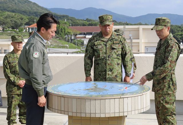 Japanese Defense Minister Shinjiro Koizumi during an inspection of an army base on Ishigaki Island, Okinawa.