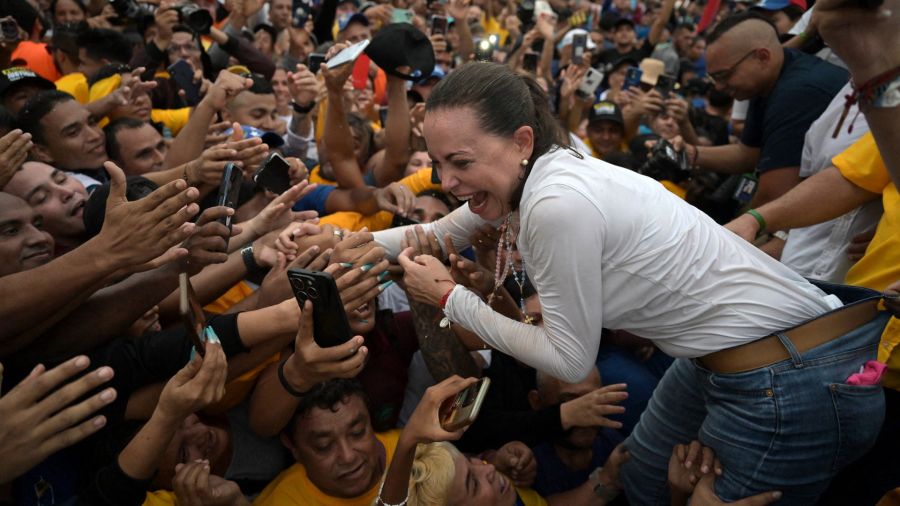Photogallery Venezuelan opposition leader María Corina Machado greets her supporters during a demonstration in Maracaibo, Zulia state, Venezuela