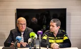 Mayor Harry de Vries (left) of the municipality of Montferland speaks to the press about the heavy fireworks thrown at council members.  