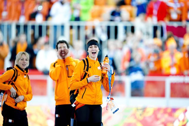 Margot Boer sees that she has won the bronze medal in the 1,000 meters at the 2014 Winter Olympics in Sochi.