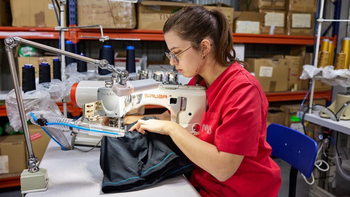 A Lurbel worker creating one of their products