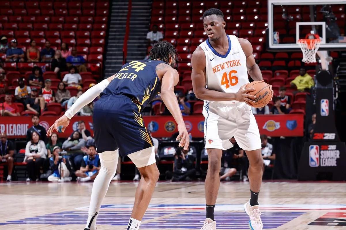 Nnaji watching a Summer League game with the Knicks