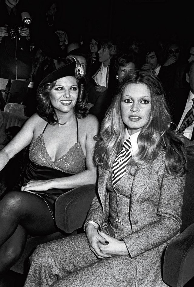 Bardot (right) with Claudia Cardinale at the premiere of 'Les Petroleuses' in Paris, 1971. 