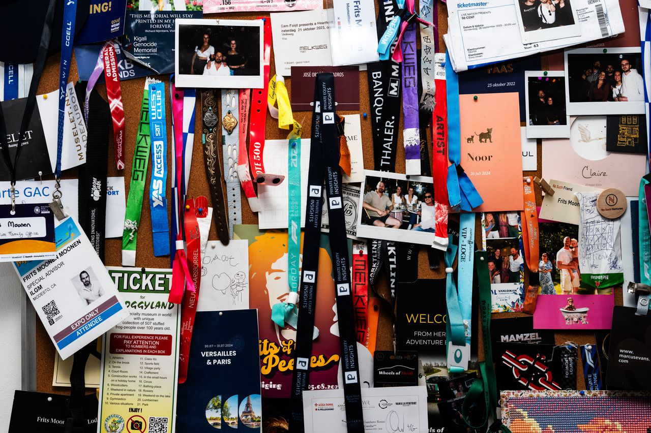 Festival tickets hang in the kitchen as a reminder.