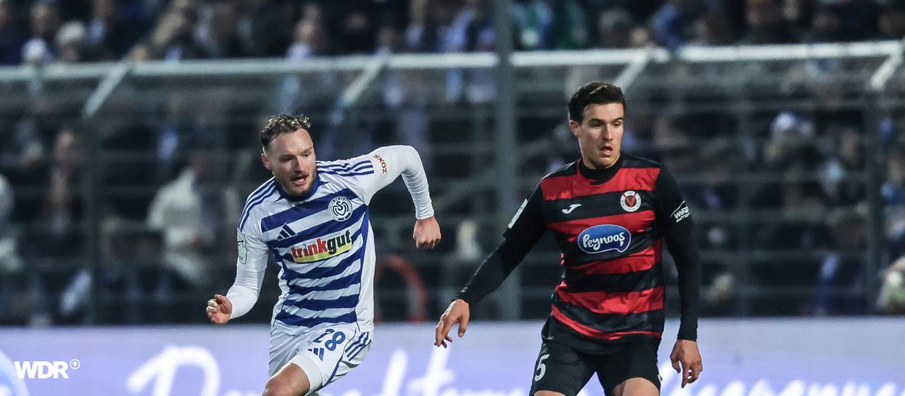 Viktoria Cologne's Leonhard Münst (r.) in a duel for the ball with Duisburg's Florian Egerer 