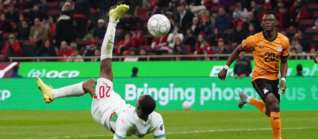 Ayoub El Kaabi scores Morocco's third goal with an overhead kick