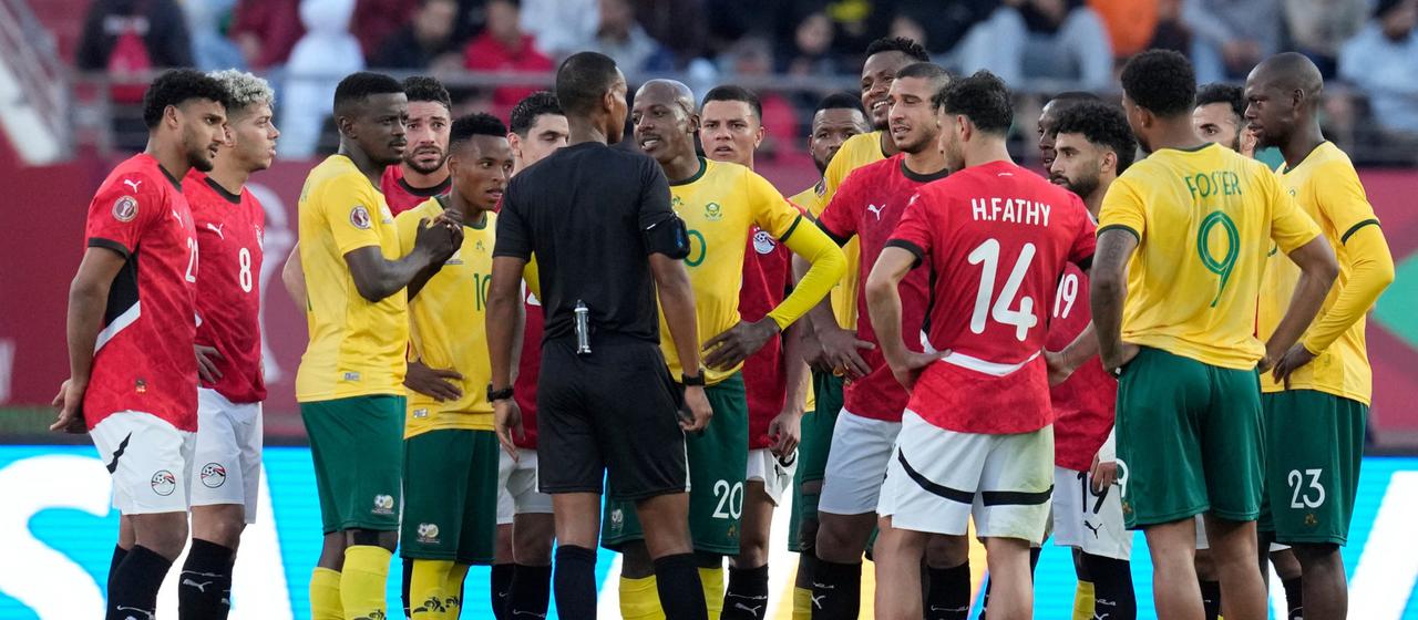 The referee in focus during Egypt vs. South Africa