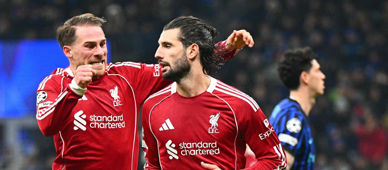 Liverpool's Dominik Szoboszlai celebrates the goal with his teammate Alexis Mac Allister