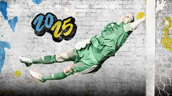 Keeper Ann-Katrin Berger stretches for a ball.