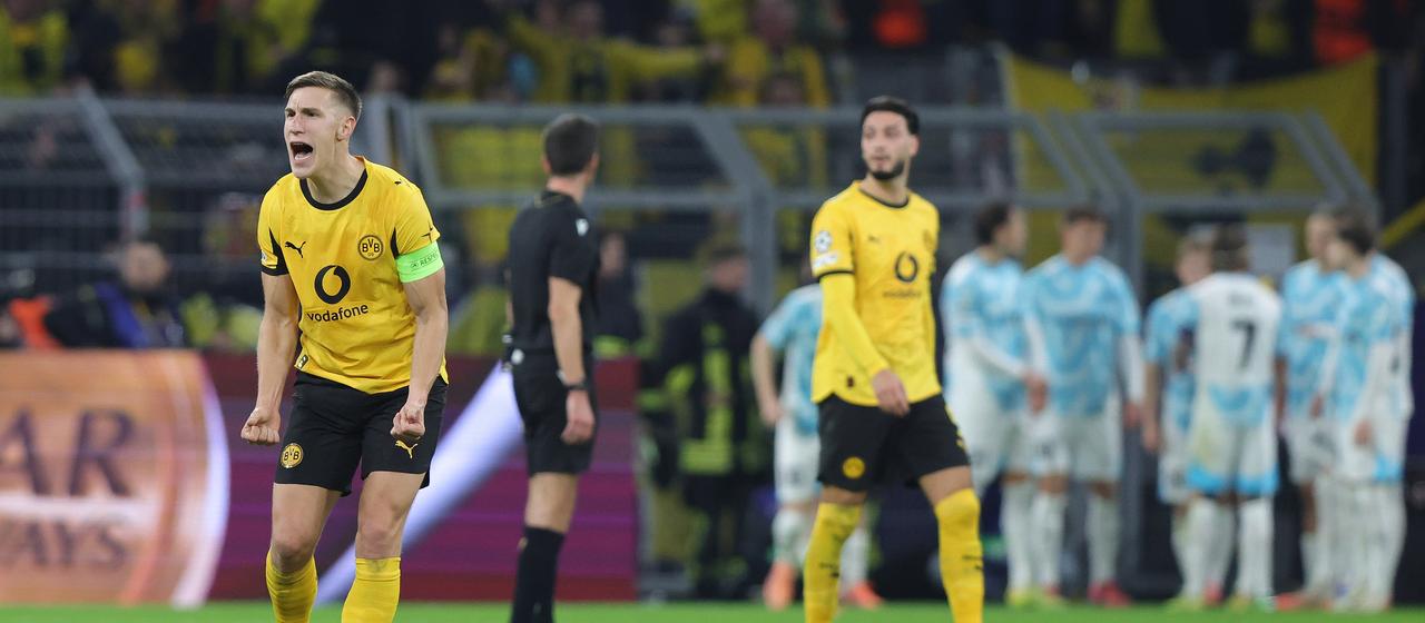 Nico Schlotterbeck shouts towards his teammates
