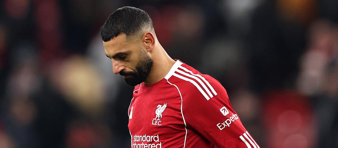 Mohamed Salah looks disappointed at the ground