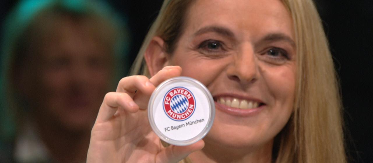 A ball in the DFB Cup quarter-final draw shows FC Bayern Munich
