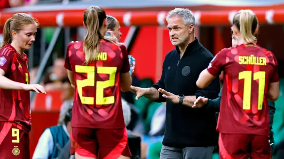 National coach Christian Wück with his players